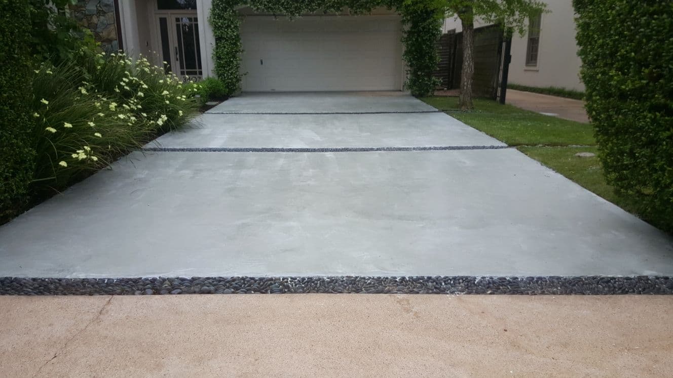 Elegant Gray Concrete Stained Driveway Upgrade image