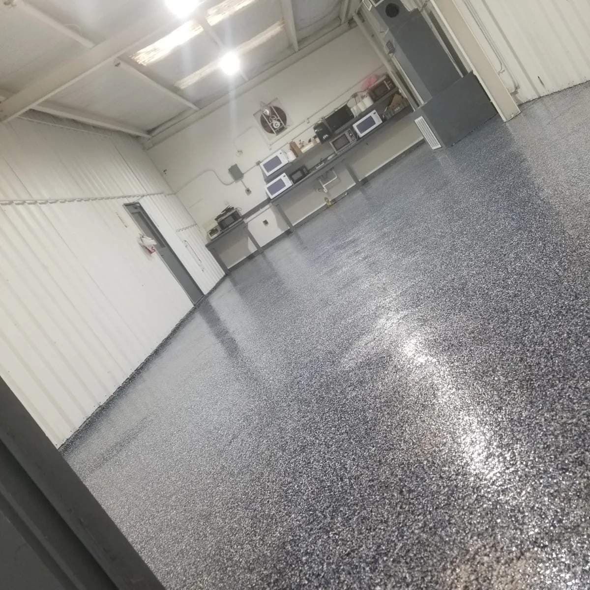 Sleek Epoxy Flake Flooring in Cypress TX Garage