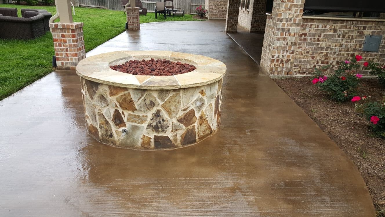 Stunning Concrete Patio with Fire Pit in Spring TX image