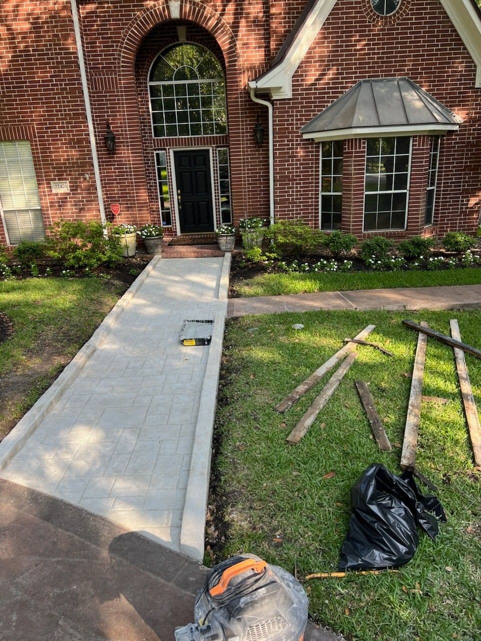 Gallery photos for Tomball Pathway Transformation with Stamped Concrete: Image #1